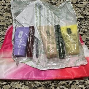 Clinique Cosmetic Bag & Makeup, new